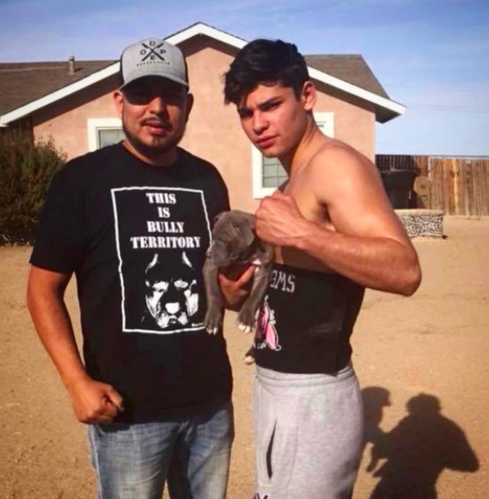 Boxing Championg Ryan Garcia with a Manmade Kennels Puppy